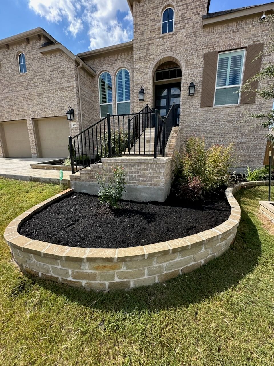 Elegant Front Yard Makeover with Fresh Mulch